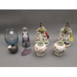 Pair of Naples porcelain figures of ladies wearing floral decorated crinoline dresses, together with