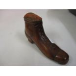 Carved wooden pincushion in the form of a boot Heel to toe is 3.5ins Height is 2.75ins We believe