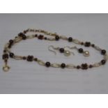 Silver gilt and freshwater pearl necklace together with a pair of similar earrings
