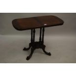 Victorian figured walnut rectangular centre table on turned column and splay supports