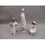 Lladro figure of a girl carrying a basket, 13ins high together with another of a girl carrying two