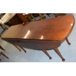 Good quality reproduction fruitwood wake table, the oval drop leaf top above eight tapering supports