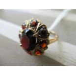 9ct Gold garnet set oval cluster ring