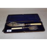 Cased pair of silver fish servers with pierced and floral engraved blades (case at fault)
