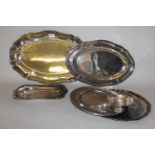 Two white metal (800 mark) oval meat dishes together with a white metal (835 mark) shallow dish, a