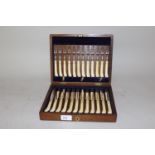 Cased set of twelve Sheffield silver dessert knives and forks with carved ivory handles, 1918