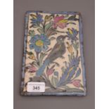 19th Century Qajar pottery tile painted with bird and floral designs, 8.5ins x 5.75ins approximately