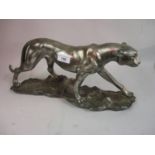 Art Deco style silvered composition figure of a panther, 17.5ins wide (at fault)