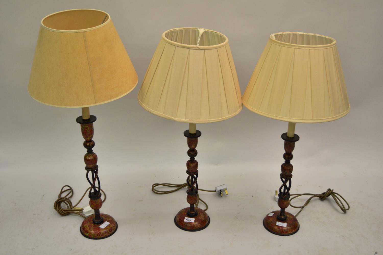 Set of three Kashmiri floral decorated table lamps All are straight and in good condition but they