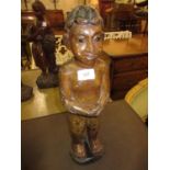 Antique Eastern carved and painted wooden figure of a boy, 18ins high