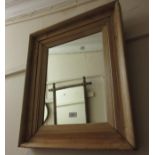 Polished pine rectangular wall mirror, 24.5ins x 20.5ins, together with a set of five Avery cast