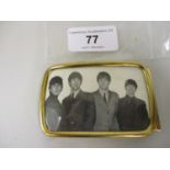 Gilt metal buckle inset with photograph of The Beatles