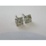 Pair of 18ct white gold brilliant cut diamond ear studs with claw settings, 1.03ct total, with