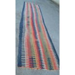 Large antique Kelim runner woven with a stylised interlocking band design, 17ft x 4ft