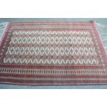 Good quality mid to late 20th Century Tekke rug with multiple gol design on an ivory ground with