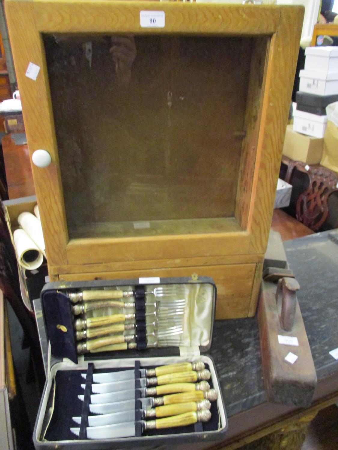 Small glazed pine wall cabinet, a wooden block plane and a cased set of six horn handled knives