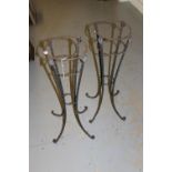 Pair of wrought iron champagne bucket stands