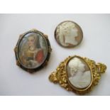 19th Century oval carved shell cameo portrait brooch in an ornate gold mount, together with a