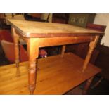 Victorian stripped pine kitchen table on turned supports, 31ins x 46ins together with a set of