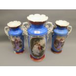 Garniture of three Paris porcelain two handled vases decorated with panels of figures on a blue