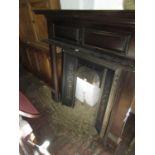 Reproduction Victorian style mahogany and cast iron fireplace insert and surround, 52.5ins x 54
