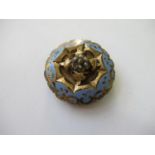 Victorian circular enamel decorated brooch set seed pearls and a diamond chip (minus one seed