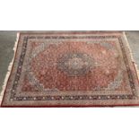 Indo Persian carpet with a medallion and all-over Herati design on a red ground with multiple