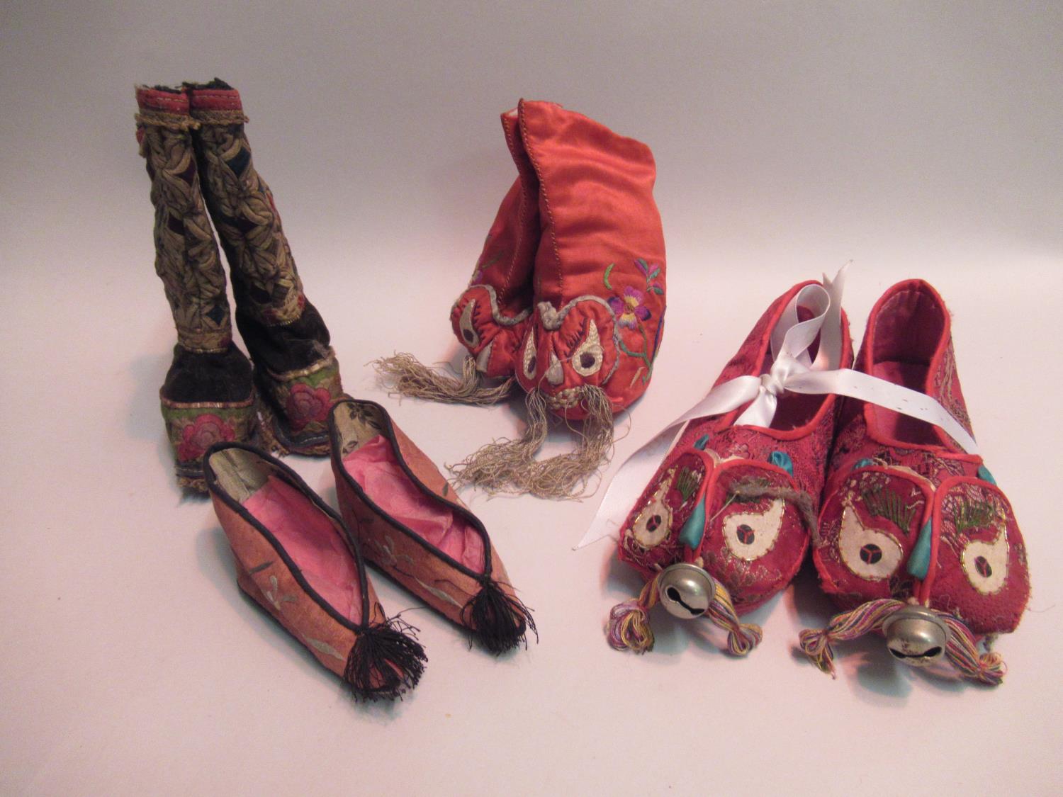 Four pairs of Chinese silk embroidered shoes and slippers