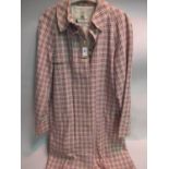 Aquascutum raincoat, in a red, black and cream check design