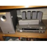 Yamaha amplifier HTR-554ORDS with five surround sound speakers and subwoofer (minus remote