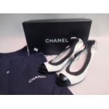 Pair of Chanel white and black patent leather shoes, size 38.5 with original box and dust covers