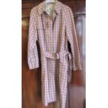 Aquascutum raincoat with belt, in a red, black and cream check design