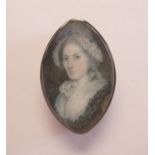 19th Century double sided oval portrait miniatures of a lady and gentleman Overall size about 30 x