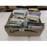 Box containing a quantity of early to late 20th Century postcards