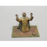 Miniature Austrian cold painted bronze figure of an Arab kneeling on a prayer rug, 1.75ins wide