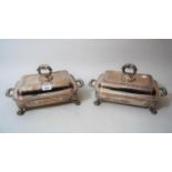 Pair of good quality rectangular silver plated entree dishes with covers and stands, raised on lions