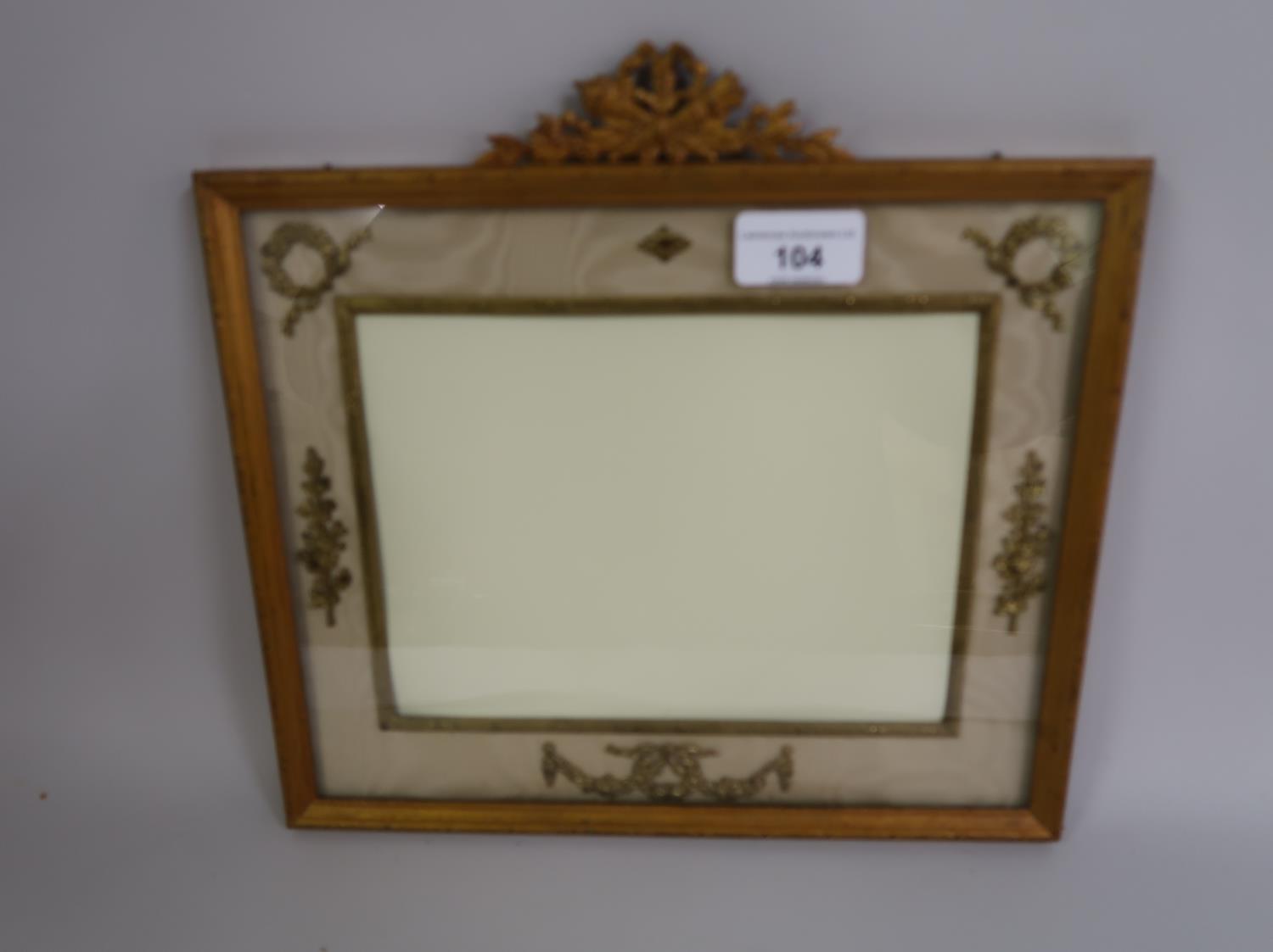 Late 19th / early 20th Century French gilt metal photograph frame with swag and torch surmount