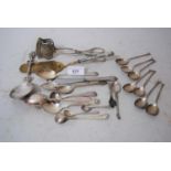 Bag containing a quantity of various silver flatware including white metal servers and serving