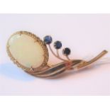 1960's Gold floral spray brooch set large oval opal and three sapphires, 11g, 64mm wide, the opal
