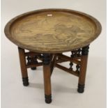 Early 20th Century Japanese circular elm occasional table carved with waterfowl, signed with