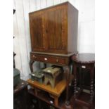 Mid 20th Century mahogany cocktail cabinet with two raised panel doors above a single drawer, raised