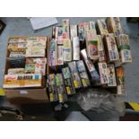 Two boxes containing a quantity of various model construction kits including Airfix Heller Italeri