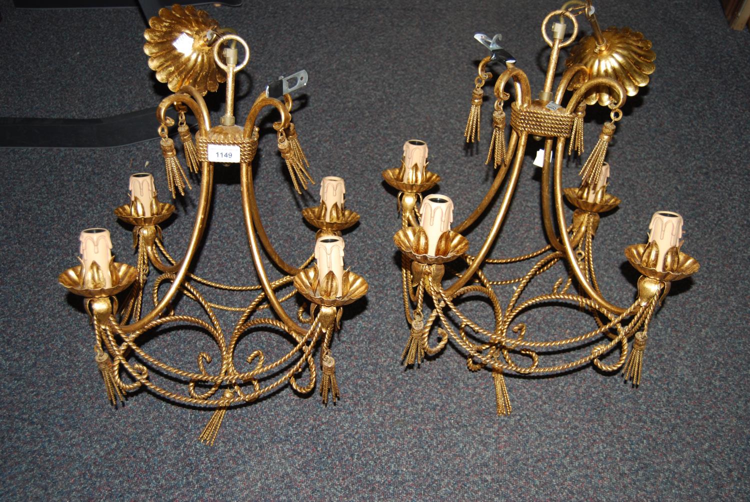 Pair of Christopher Wray gilt metal four light electroliers of scroll rope and swag design, 22ins