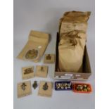 Large collection of loose and mounted on card military badges, with two small boxes of military