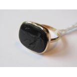 Early intaglio seal in a later gold ring mount, 3.7g