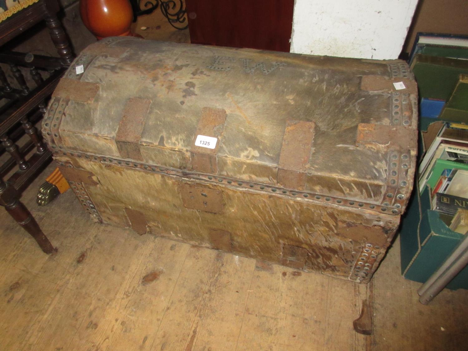 19th Century Continental pony skin covered dome top trunk with metal mounts (at fault), 28ins