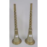 Pair of Tibetan wooden metal covered horns with gilded decorative mounts and rings, 19.5ins high