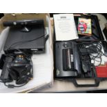 Xbox 360 with two controllers, quantity of games and a Sega Master System II power base in