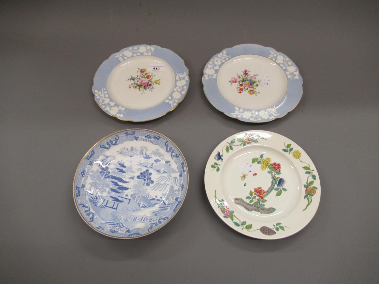 Pair of Spode plates painted with sprigs of summer flowers within pale blue and white relief moulded