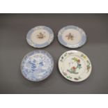 Pair of Spode plates painted with sprigs of summer flowers within pale blue and white relief moulded